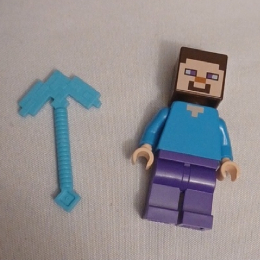 4/$80 Lego Minrcraft Steve Minifigure In Blue & Purple with Accessory